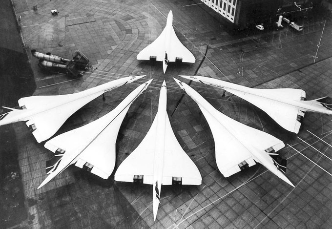 25 6 British Airways Concordes lined up on the ramp of the engineering base at Heathrow Airport 1986 DR