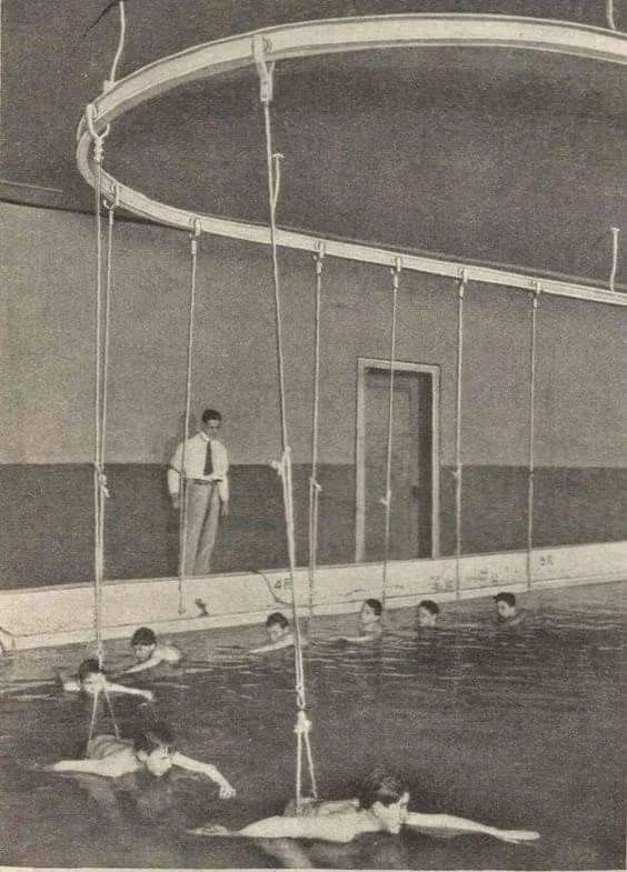 31 LEARNING TO SWIM A water merry go round is used to assist boys learning to swim A Cincinnati school in 1914 DR
