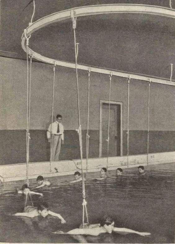 31 LEARNING TO SWIM A water merry go round is used to assist boys learning to swim A Cincinnati school in 1914 DR