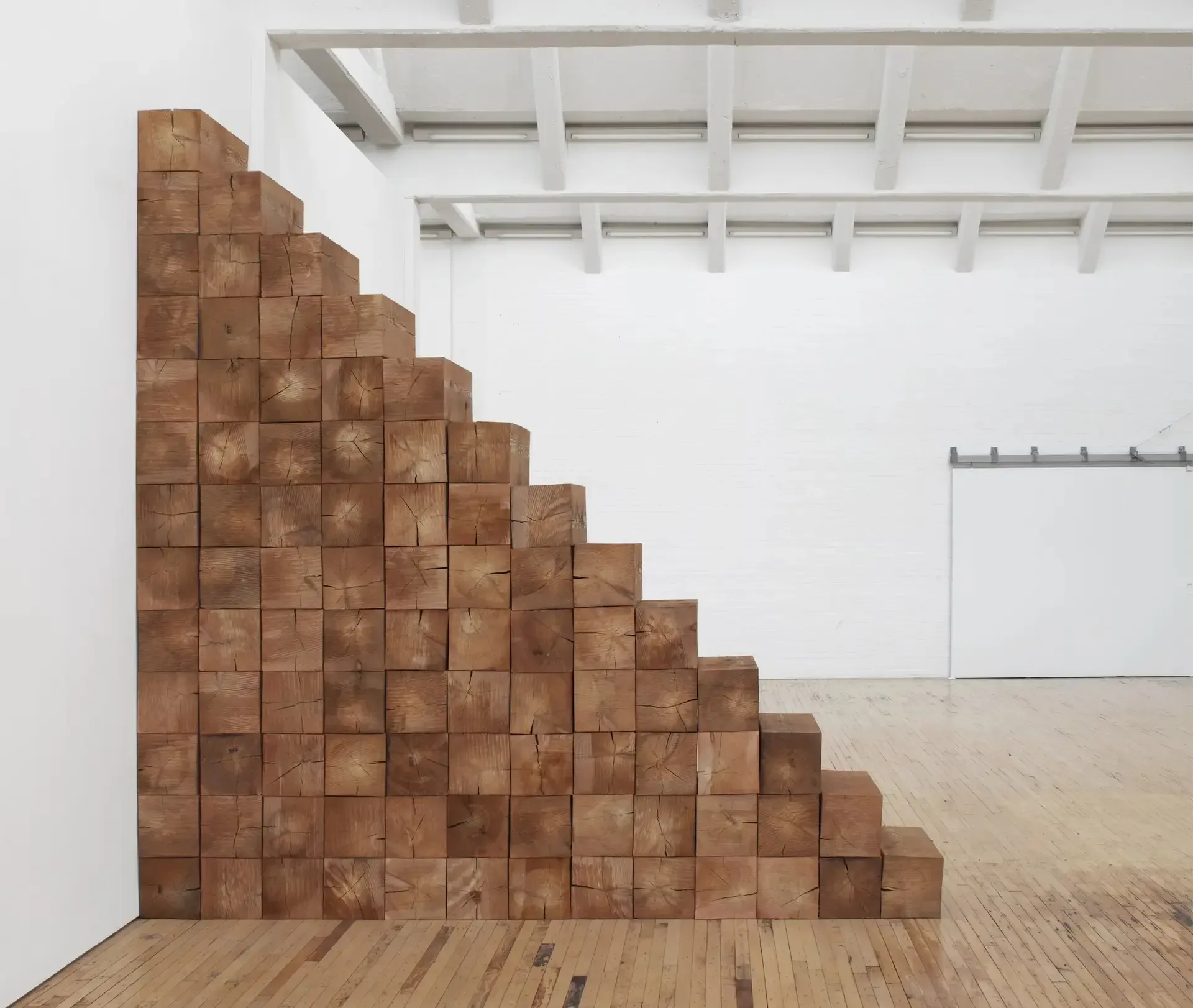 14 Sculpture as Place 1958 2010 installation view in New York 2014 2015 2024 Carl Andre Artists Rights Society courtesy Dia Art Foundation photo Bill Jacobson Studio