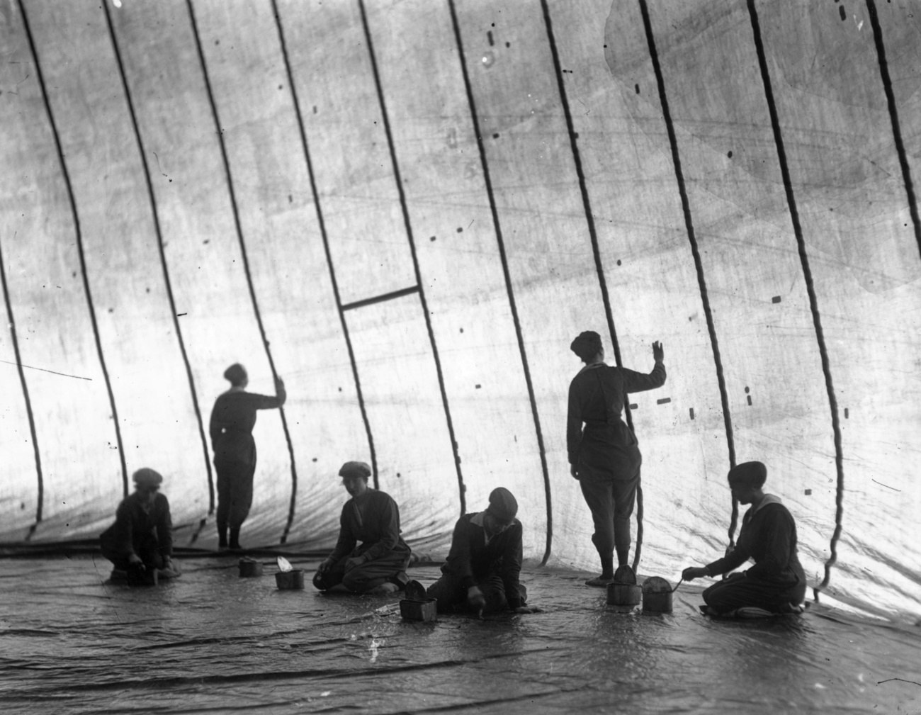 10 Women patching fabric for the Hindenburg Zeppelin 1930s Unknown