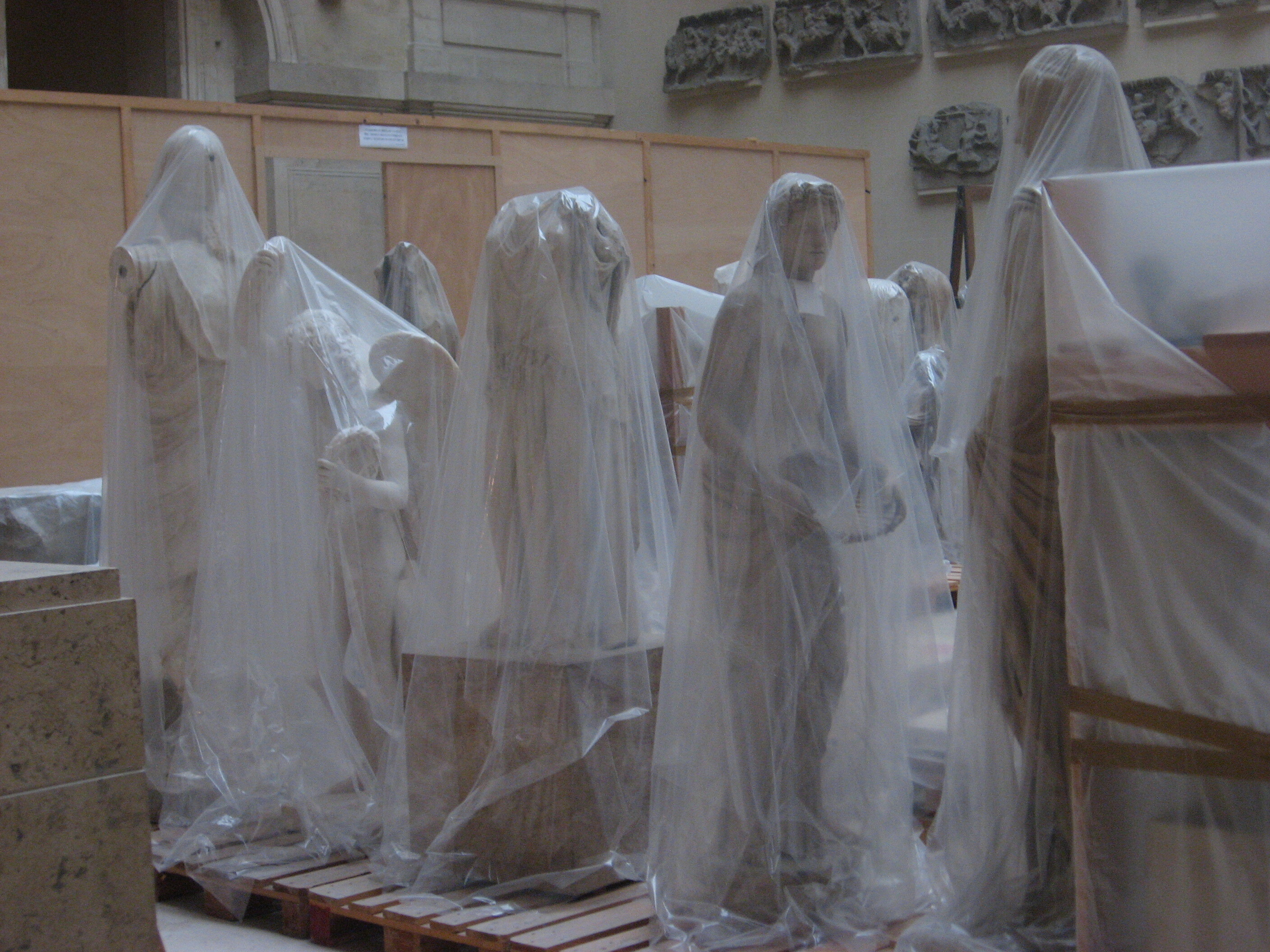 6 Wrapped Statues in the Louvre Musuem Unknown