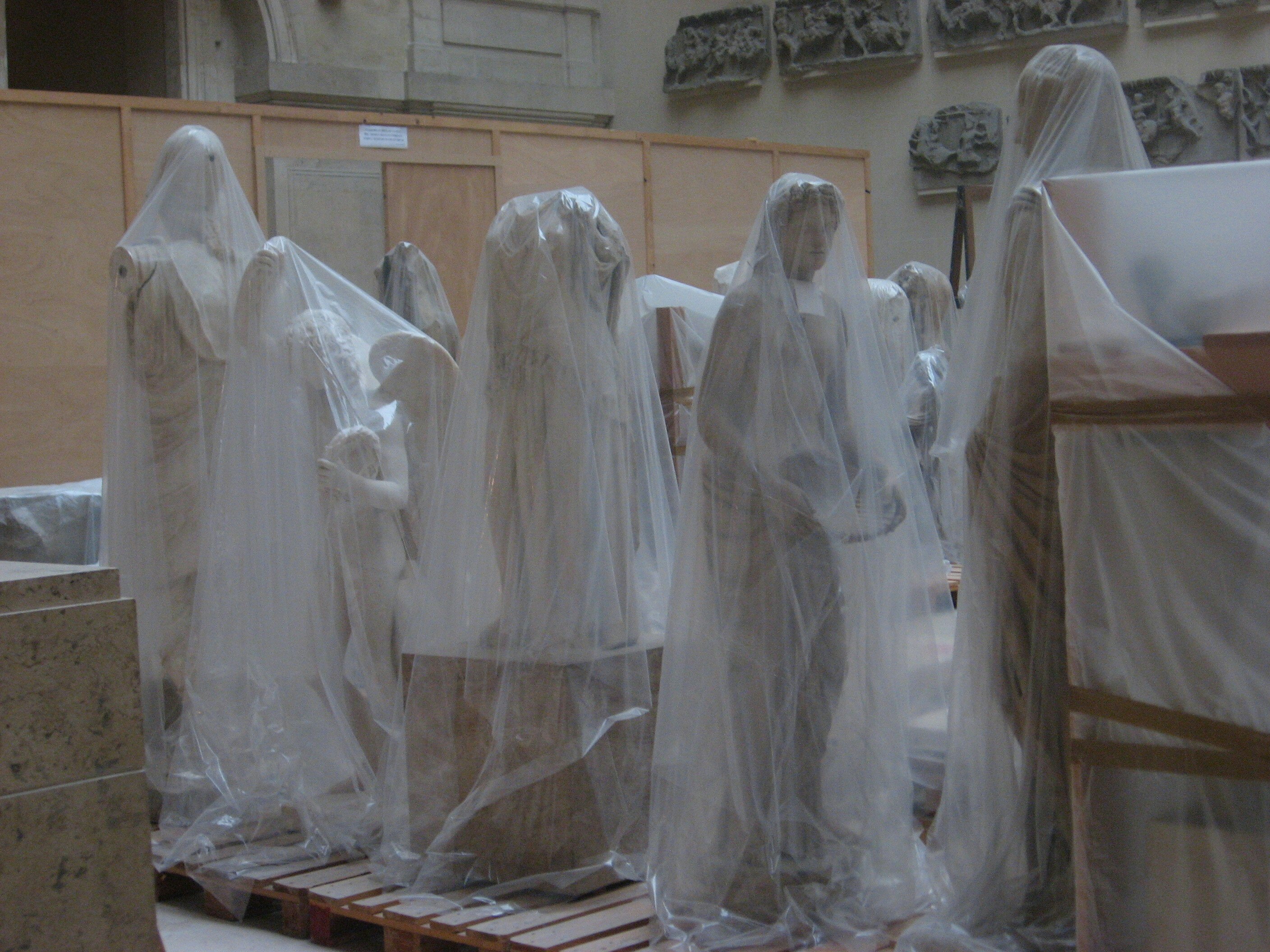 6 Wrapped Statues in the Louvre Musuem Unknown